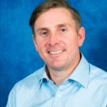 A headshot image of Dr Rob Mead