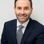 A headshot image of Mr Harry Orlans