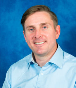 A headshot image of Dr Rob Mead